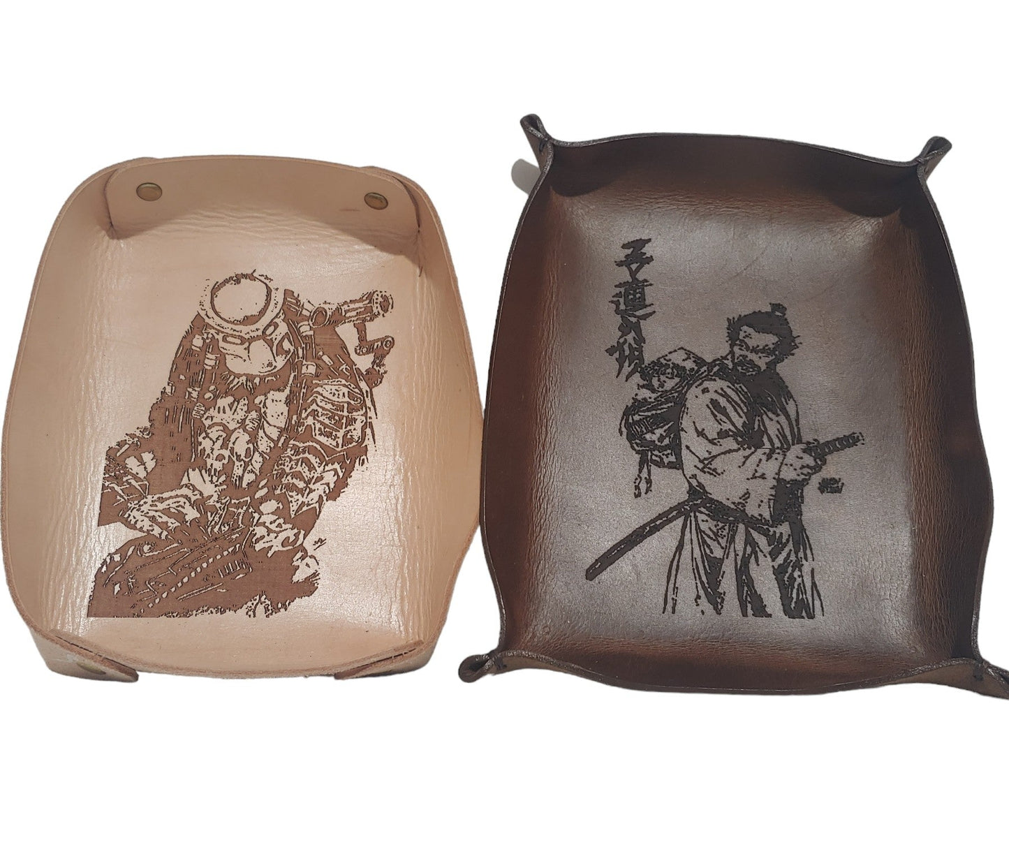 Fan Art Valet Trays Made of Vegtan Leather. Measures approx 7" x 5" 2 pieces currently available; Lone Wolf & Cub Predator