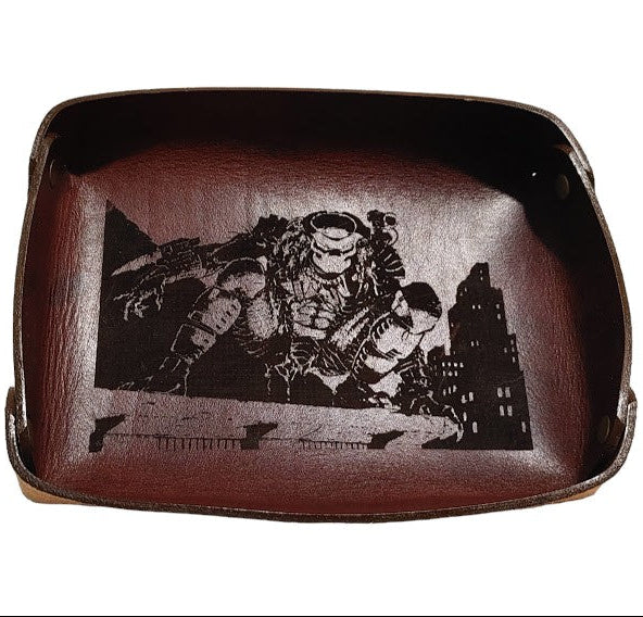 Fan Art Valet Trays Made of Vegtan Leather. Measures approx 7" x 5" 2 pieces currently available; Lone Wolf & Cub Predator
