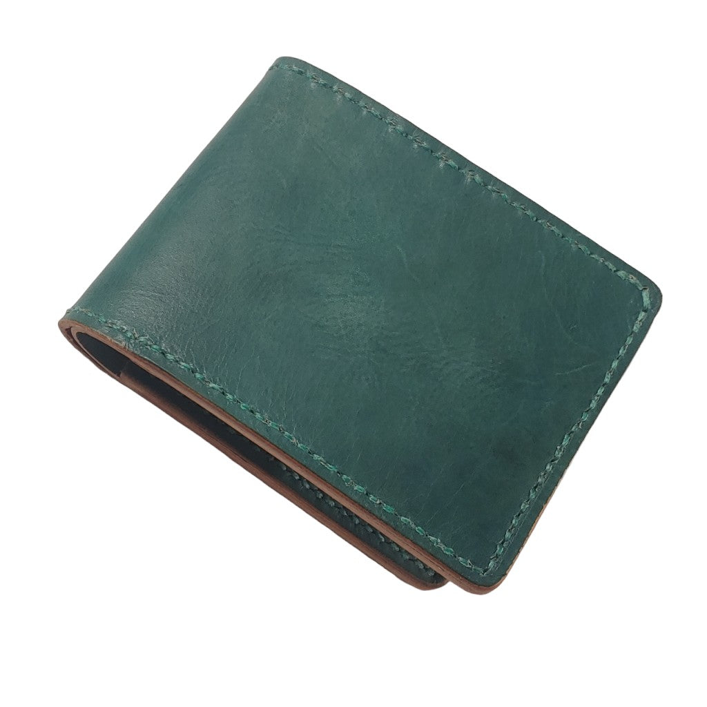 All Hand-Crafted from Natural Vegtan Leather Billfold Wallet. Hand-Dyed and Hand-Stitched. 3 Pieces currently Available! Includes Main Cash Pocket, and 6 card pockets for bank, credit and ID cards. Designed to last a lifetime! Patinas beautifully over time!
