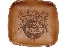Load image into Gallery viewer, Fantasy Dice Tray Made of Vegetable Tanned Leather, hand-dyed a Medium Brown. Logo is Laser Engraved. 7″ x 7″ *Includes a standard set of 7 dice.
