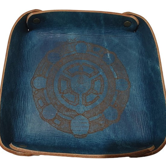 Fantasy Dice Tray Made of Vegetable Tanned Leather, hand-dyed a Medium Brown. Logo is Laser Engraved. 7″ x 7″ *Includes a standard set of 7 dice.