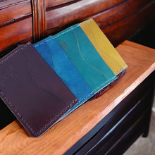 Load image into Gallery viewer, Minimalist Card Wallet - Hand-Dyed Made from Hand-dyed Vegtan Leather Designed to carry just your most important bank cards, credit cards and ID. Features 2 outside pockets, and one interior pocket. All hand-stitched.
