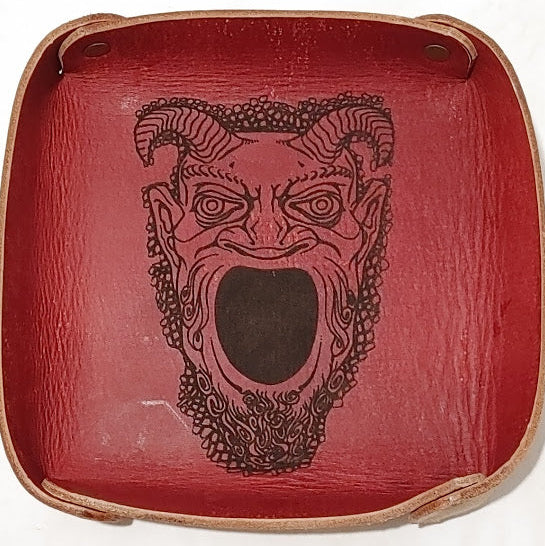 Fantasy Dice Tray  Made of Vegetable Tanned Leather, hand-dyed a Medium Brown.  Logo is Laser Engraved. 7″ x 7″  *Includes a standard set of 7 dice.