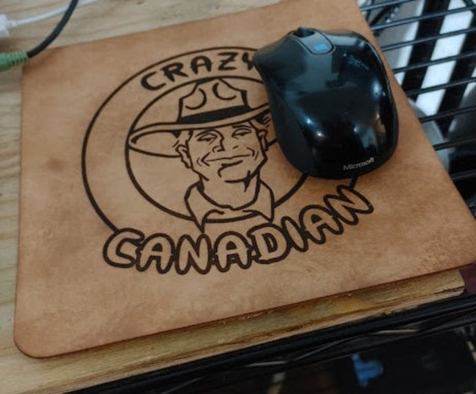Crazy Canadian Mouse Pad  Vegan Leather Mouse Pad with Laser Engraved Crazy Canadian Logo.   